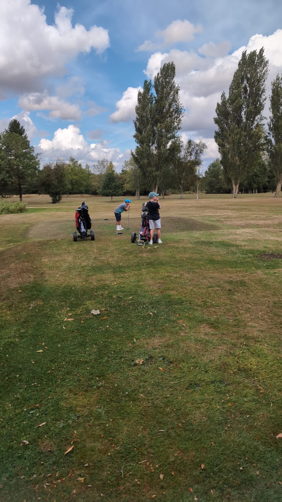 Raff and Noah on the golf course